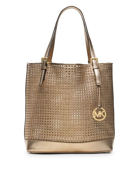 michael kors gold ring purse|gold Michael Kors tote bag.